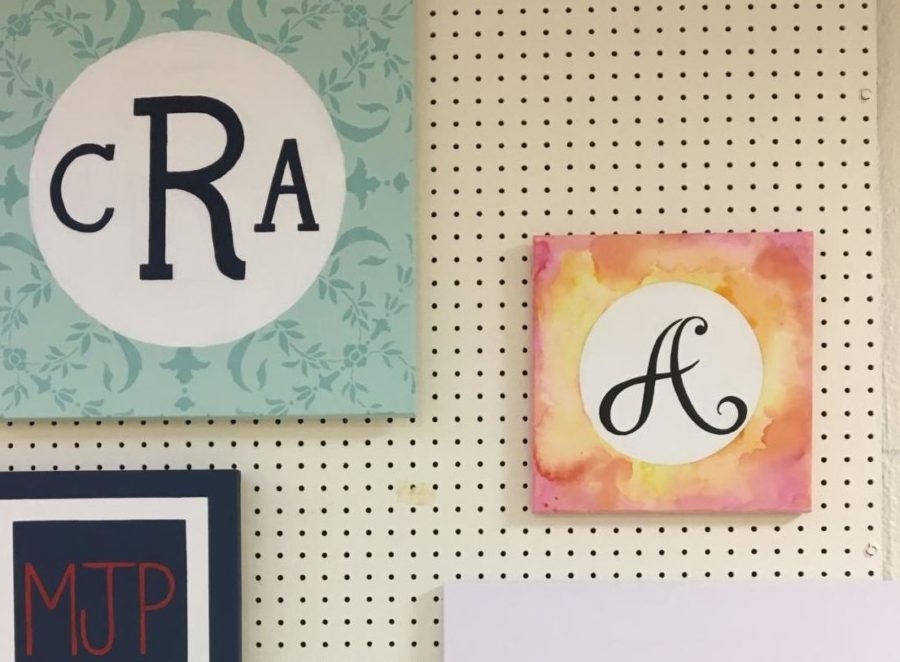 One+of+NAHS+current+projects+include+monogram+paintings+of+the+initials+of+a+student.