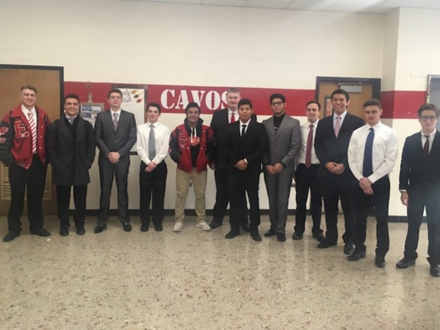 Members+of+DECA+gather+in+the+cafeteria+for+a+group+photo+on+the+day+of+the+New+Jersey+DECA+Regional+Competition.+Pictured+from+left+to+right+are+Nico+Savino%2C+Ryan+Shaw%2C+Jared+Delpome%2C+Ryan+Taub%2C+Derek+Cartagena%2C+Kevin+Carey%2C+Gustavo+Ponce-Montes%2C+Rodrigo+Flores%2C+John+Mulligan%2C+Matt+Harada%2C+Jack+Terjanian%2C+and+Emmett+Wieting.