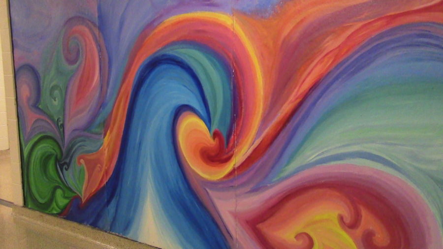 Various+swirls+of+colors+painting+by+students+in+the+sophmore%2F+junior+hallway.