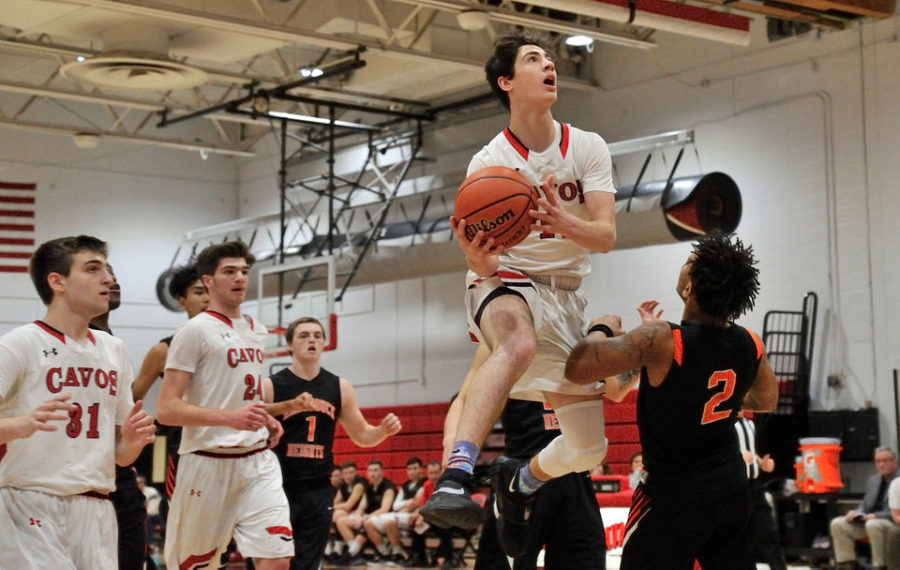 Peter+Durocher+looks+to+evade+Josiah+Purdie+and+make+the+layup.+