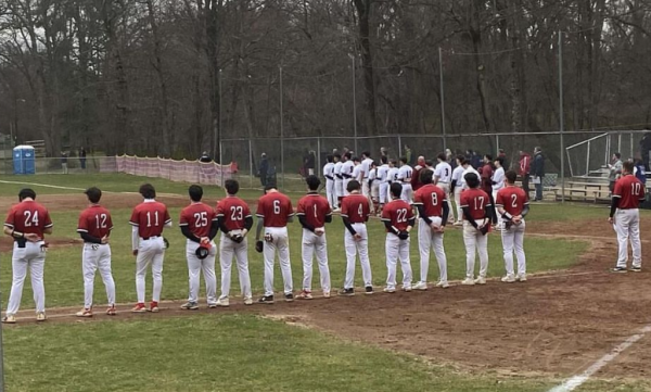Emerson standing for the national anthem before their first game at Pompton Lakes